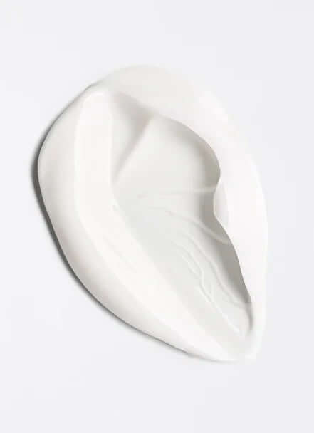 Comforting Enzyme Peeling Mask showing a smooth, white cream texture ideal for gentle exfoliation.