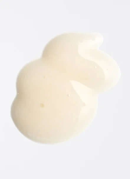Texture of a soothing Comforting Light Fluid, showcasing its lightweight and creamy consistency for sensitive skin.