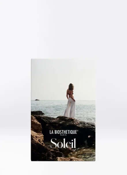 Soleil Set 2025 by La Biosthetique, showcasing sun care products next to the ocean.