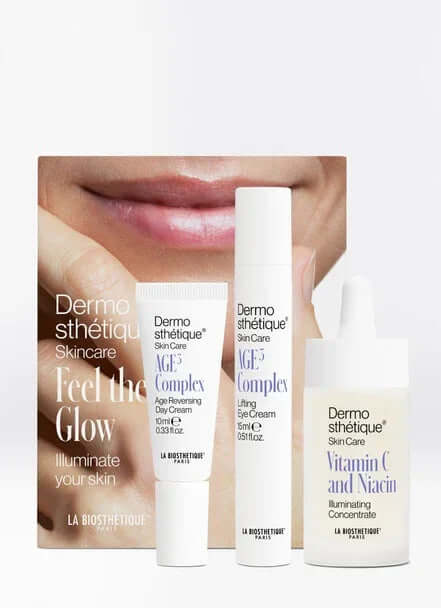 Dermoesthetique Feel the Glow Set featuring age-defying eye cream and vitamin C concentrate for radiant skin.
