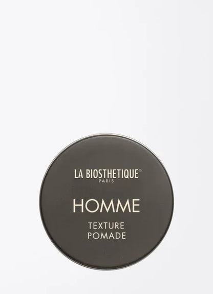 Homme Texture Pomade in stylish aluminum pot from La Biosthetique, offering modern hair styling with a sleek finish.